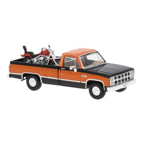 GMC Sierra Grande, Svart/Orange med motorcykel GMC Sierra Grande, Svart/Orange med motorcykel